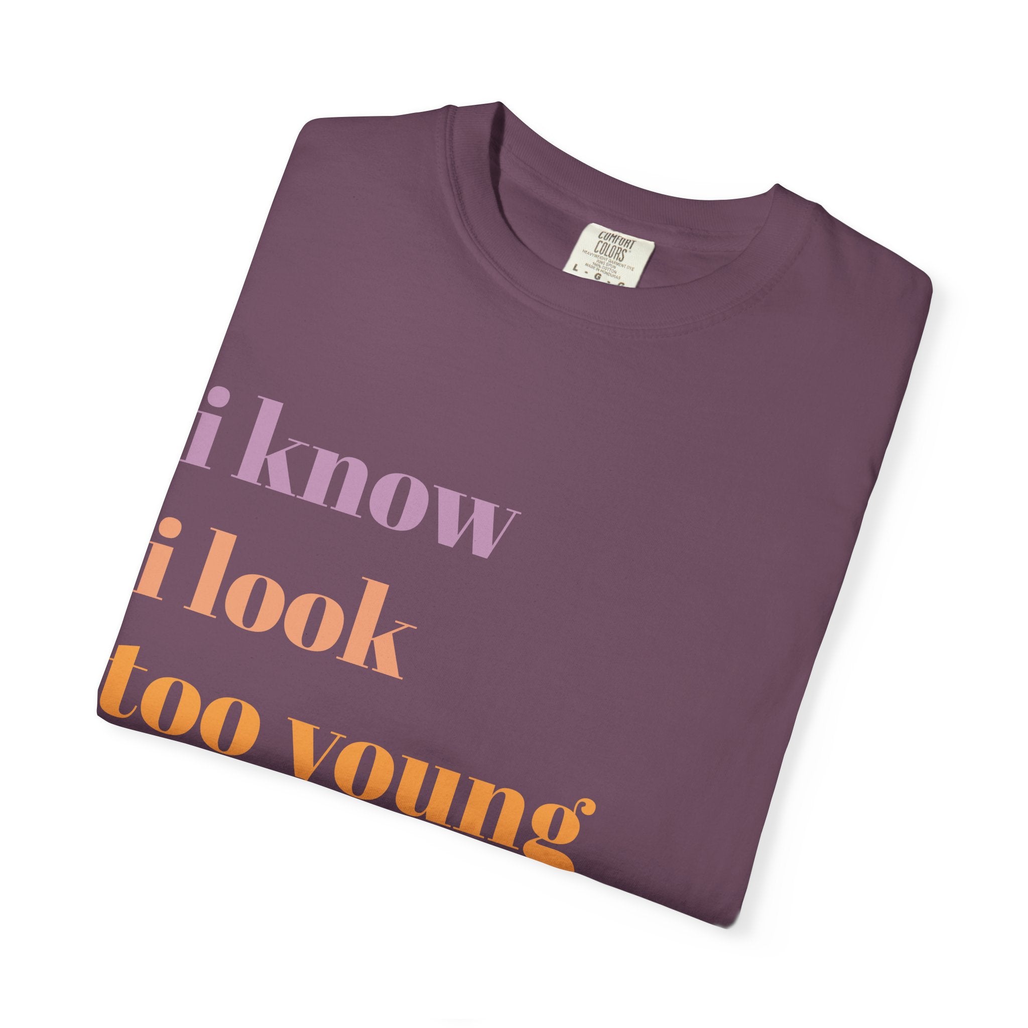 Graphic T-Shirt — "I Know I Look Too Young to Be a Grandma" Colorful Text Tee