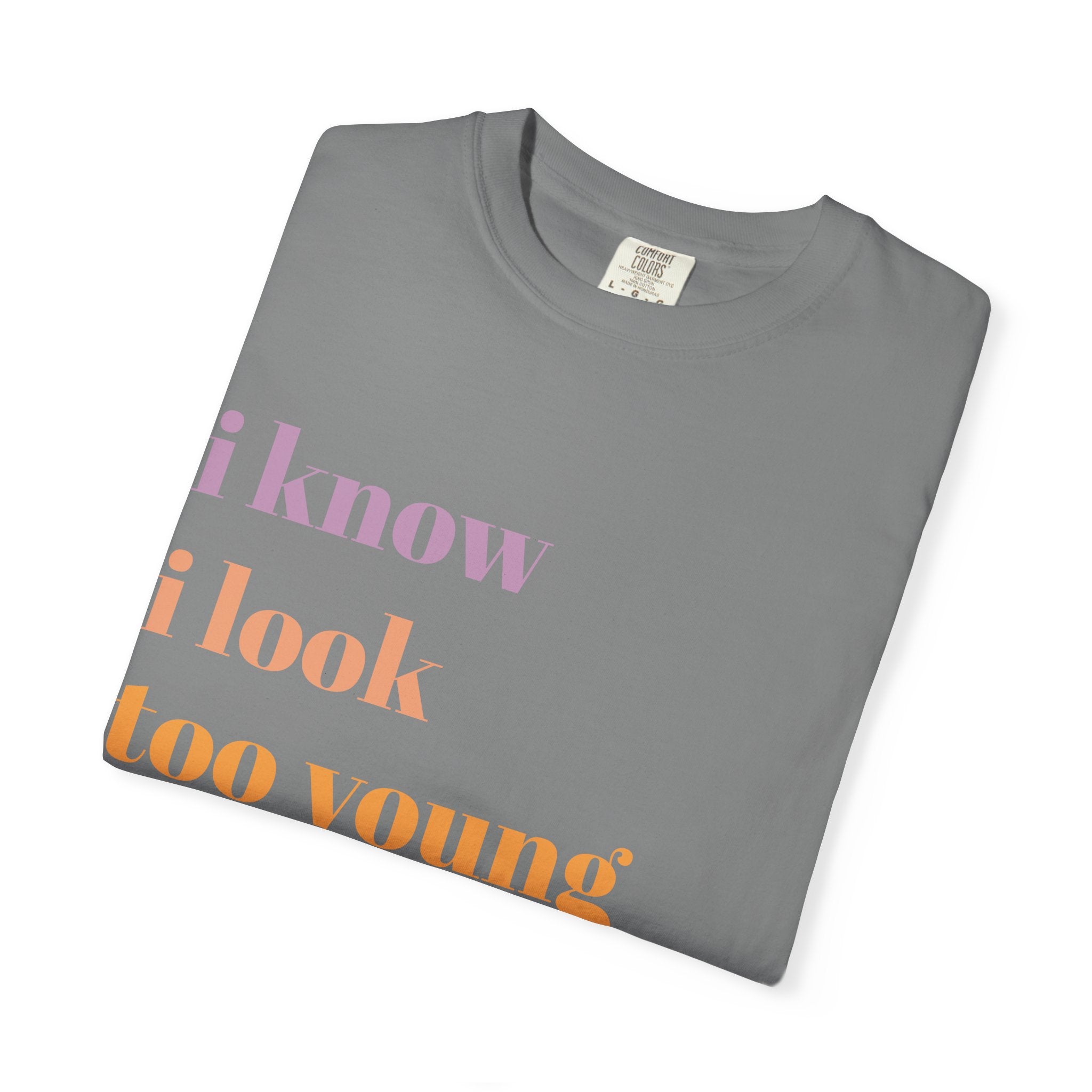 Graphic T-Shirt — "I Know I Look Too Young to Be a Grandma" Colorful Text Tee