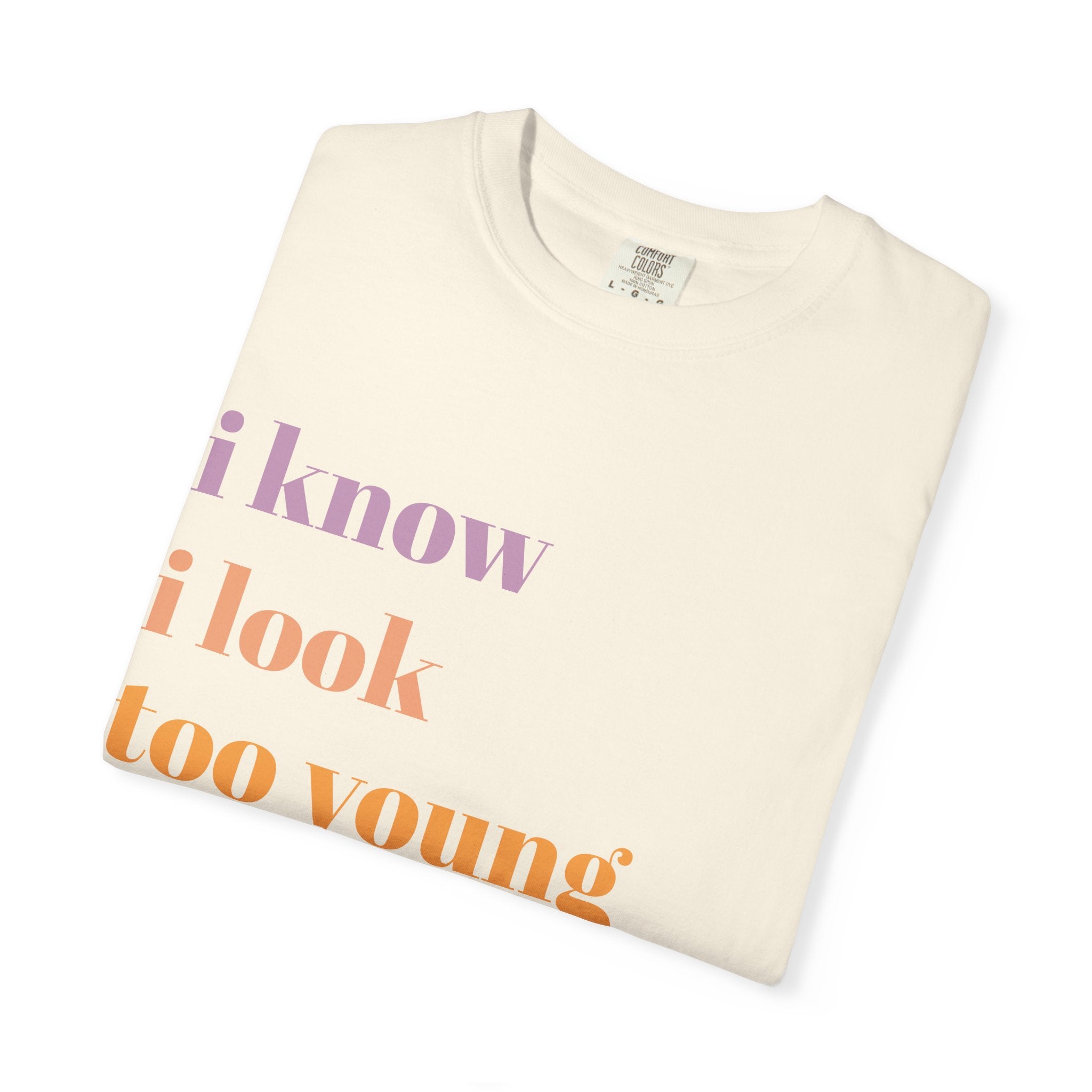 Graphic T-Shirt — "I Know I Look Too Young to Be a Grandma" Colorful Text Tee